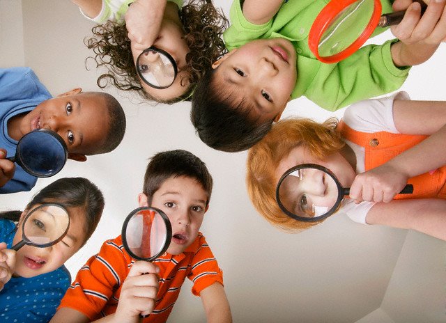 Children with Magnifying Glasses